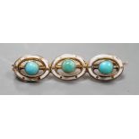 An early 20th century yellow metal, enamel and three stone turquoise set bar brooch, 29mm, gross