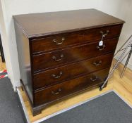 A George III mahogany chest of four graduating long drawers, height 97cm width 107cm depth 54cm