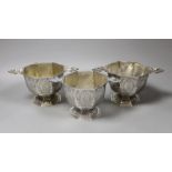 A set of three 19th century Dutch 833 standard white metal octagonal twin mask handled octagonal