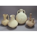 A group of Islamic terracotta vessels, Middle Eastern, possibly 12th century, including two jugs, an