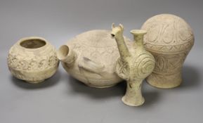 A selection of four Islamic terracotta vessels, Middle Eastern possibly 12th century, the animal