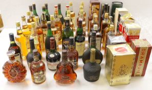 A large collection of spirits: THE GLENLIVIT, Single Malt Scotch Whisky, French Limousin Oak Finish,