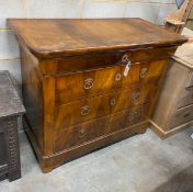 A French Second Empire figured walnut commode, fitted with four long guilt metal mounted drawers,