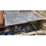 A pair of zinc topped cafe tables with cast iron bases, width 60cm depth 60cm height 74cm