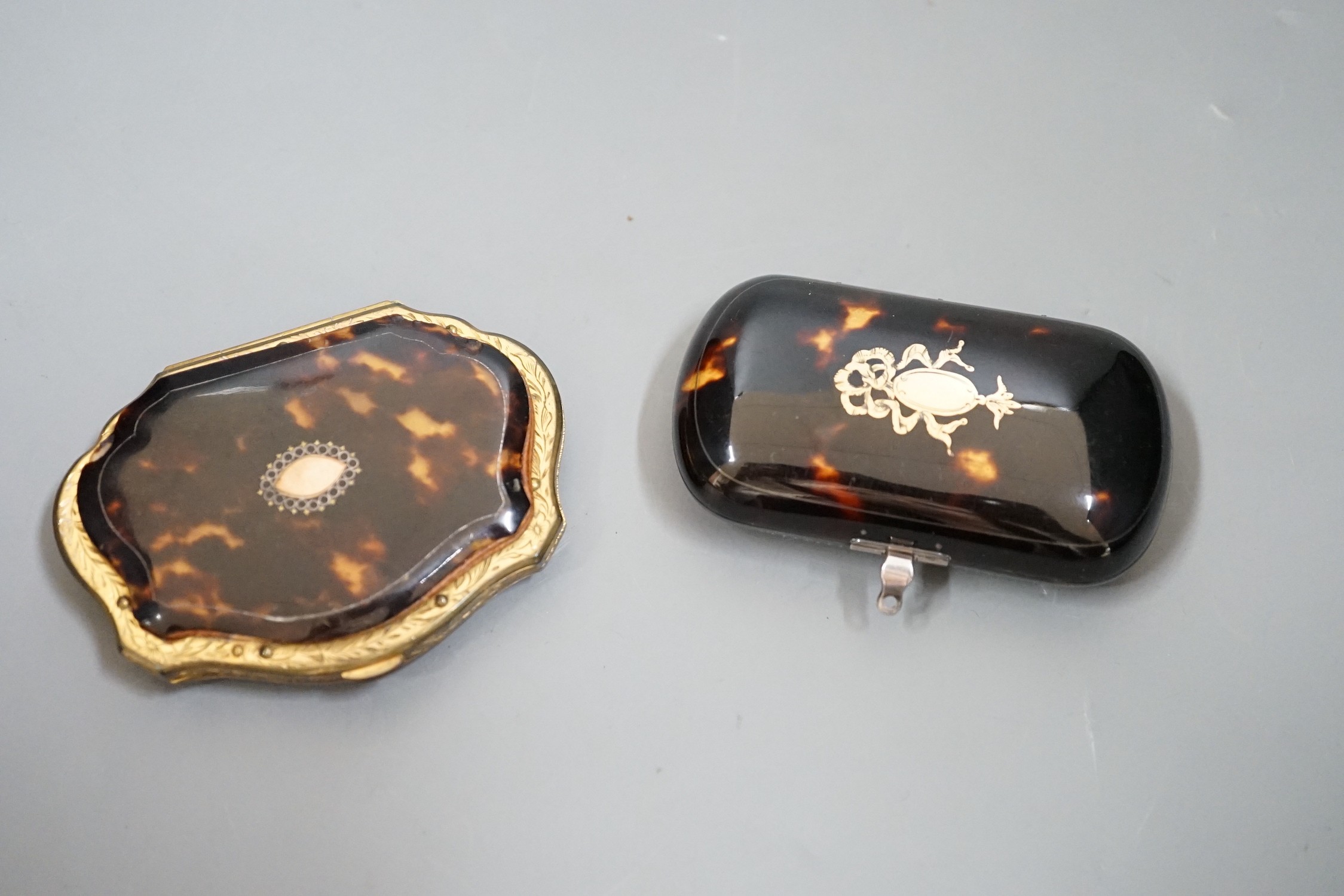 A 19th century finely worked tortoiseshell piqué work purse, with blue silk lining and a similar git - Image 4 of 5