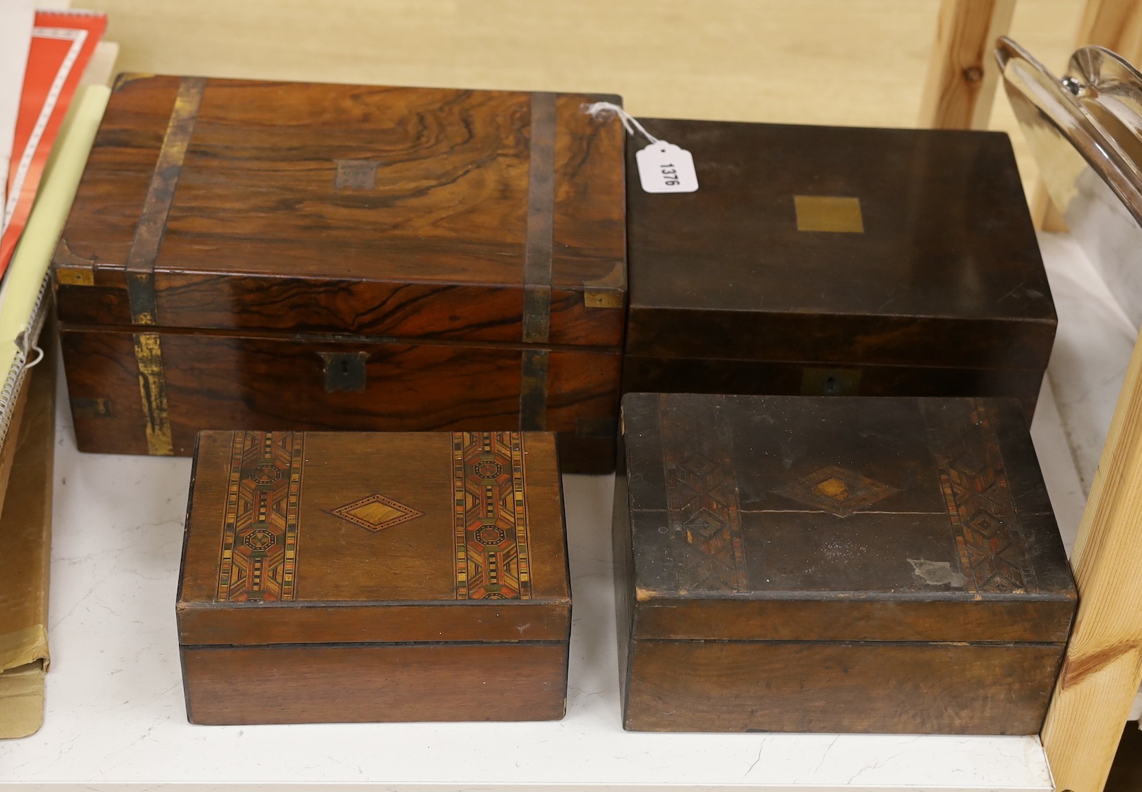 A Victorian rosewood writing slope, a similar smaller one and two boxes
