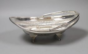 An Edwardian demi fluted oval silver fruit basket, George Howson, Sheffield, 1895, length, 28cm,