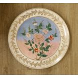 A large Doulton Burslem floral wall hanging charger, 49.5cm diameter Possibly a blank outside