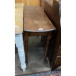 A George III mahogany drop leaf dining table with pad feet, width 106cm