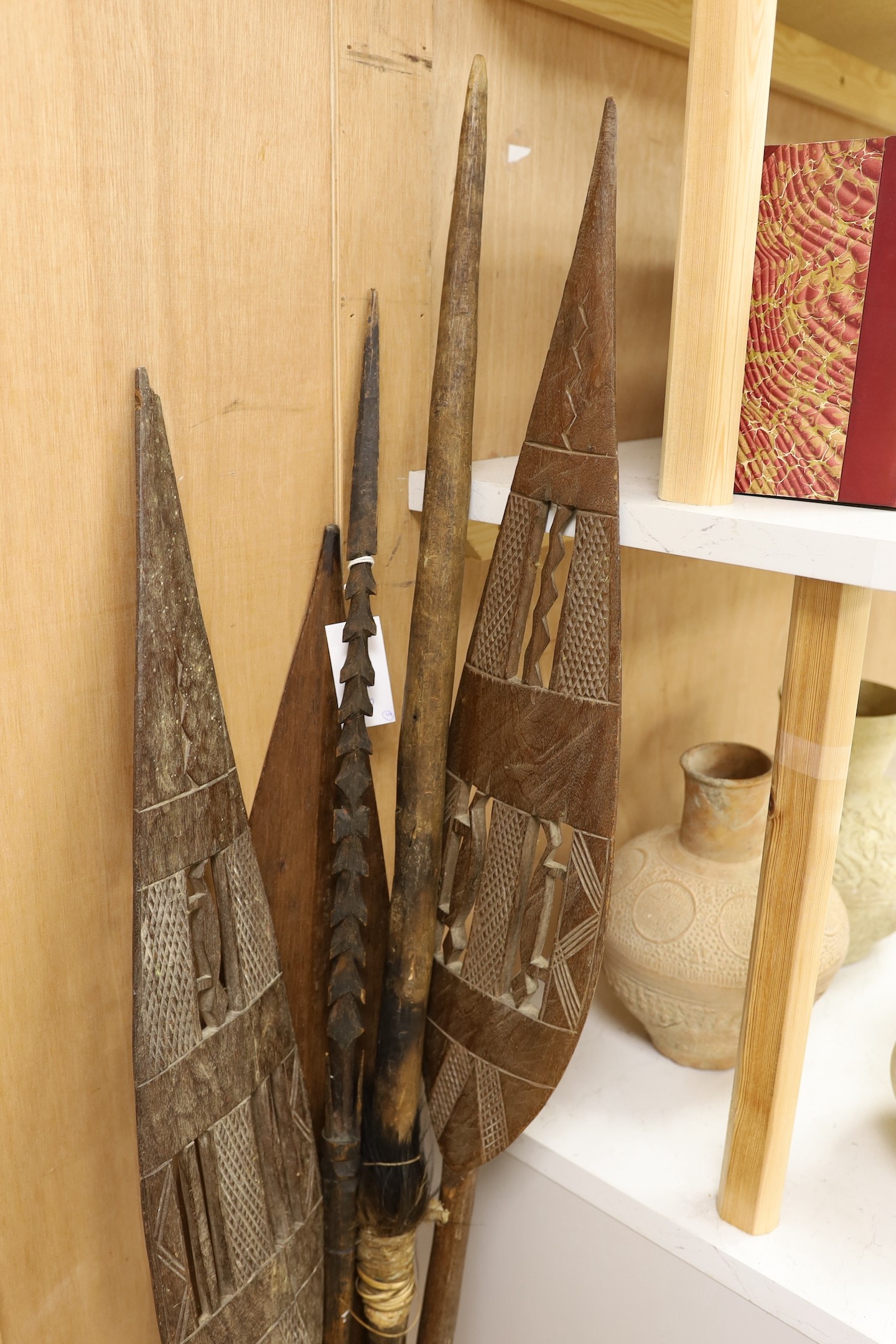 A Dayak spear paddle and four Papua New Guinea spears - Image 3 of 4