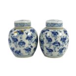 A pair of 19th century Chinese blue and white boys miniature jars and covers, 5.5 cm high