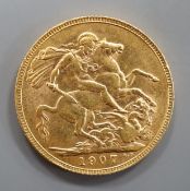 An Edward VII 1907 gold sovereign.
