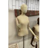 A Victorian style part painted beech mannequin on telescopic stand