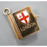 An enamelled 9ct gold photograph album charms with views and crest of London, 1.5cm gross 3.1 grams