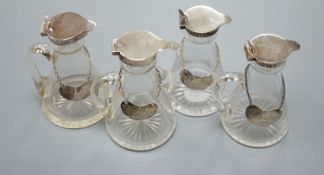 Four silver mounted cut glass whisky tots including a pair by Elkington & Co, 1930, 10.7cm, together
