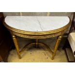 A Louis XVI style carved giltwood marble top D shaped console table, width 110cm, depth 50cm, height