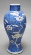 A late 19th century Chinese blue and white ‘prunus’ vase, 25cms high