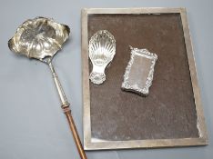 A Georgian style silver toddy ladle, London 1976, a silver mounted rectangular photograph frame, a