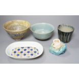 Japanese studio pottery; a group to include two bowls, and a plum dish, a fluted cup and a