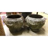 A pair of reconstituted stone garden planters, diameter 46cm, height 32cm