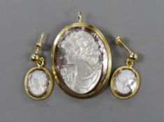 A modern suite of Italian 750 yellow metal mounted oval shell jewellery, comprising a cameo