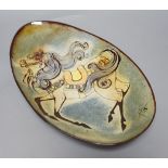 A Chelsea pottery polychrome oval dish by Joyce Morgan, 39cms long