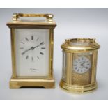 Two modern brass carriage timepieces, one oval cased