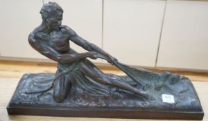 Cipriani, bronzed figure, pulling a net, 69cms wide