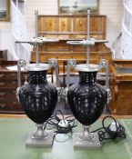A pair of classical style ribbed glass and metal table lamps, 65cms high
