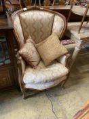 A Louis XV style walnut framed fauteuil, width 63cm, depth 50cm, height 103cm