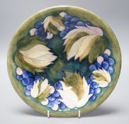 A Moorcroft ‘Pale leaf and berry’ bowl, 20cm diameter