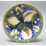 A Moorcroft ‘Pale leaf and berry’ bowl, 20cm diameter