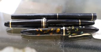 A Montblanc fountain pen and two others
