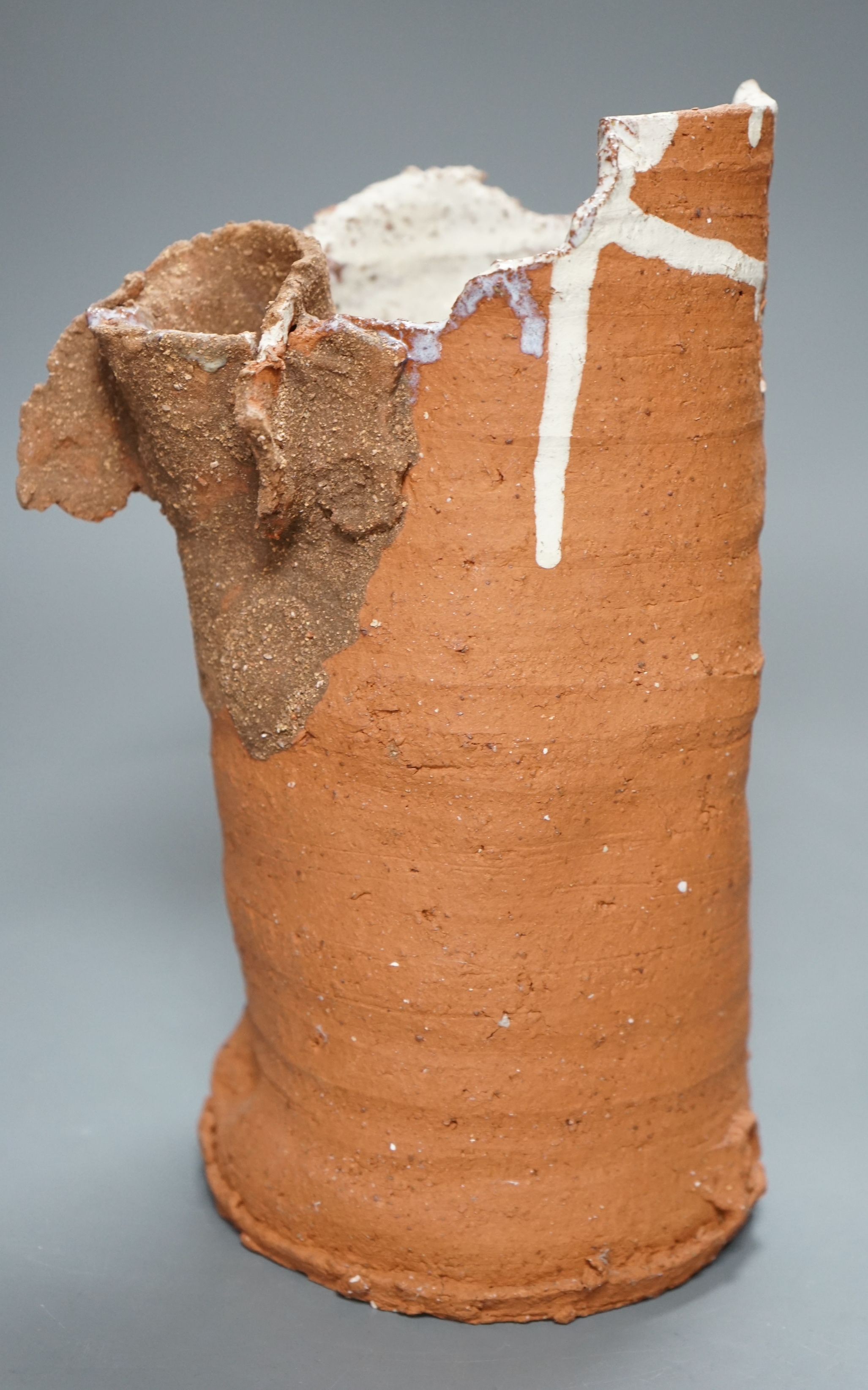 Peter Smith, a thrown terracotta cylindrical vessel with white glaze to the interior and brown