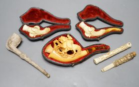 Three cased meerschaum pipes, another pipe and two bone cheroot holders