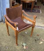 A mid century Italian 'Mufti' Michael D'Souza walnut and tan leather elbow chair, width 60cm,