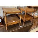 A pair of reproduction yew two tier side tables fitted slides, width 46cm, depth 46cm, height 58cm