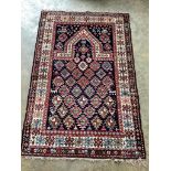 A Caucasian blue ground prayer rug, 153 x 102cm