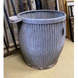 A circular galvanised grain bin, height 53cm