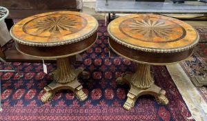 A pair of Empire style circular wood and composition faux parquetry occasional tables, diameter