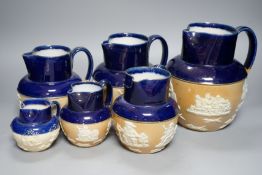 A set of six graduated set of Royal Doulton harvest jugs
