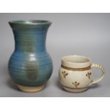 An Accolay style blue glazed stripe vase, together with a Wenford Bridge stoneware mug, both with