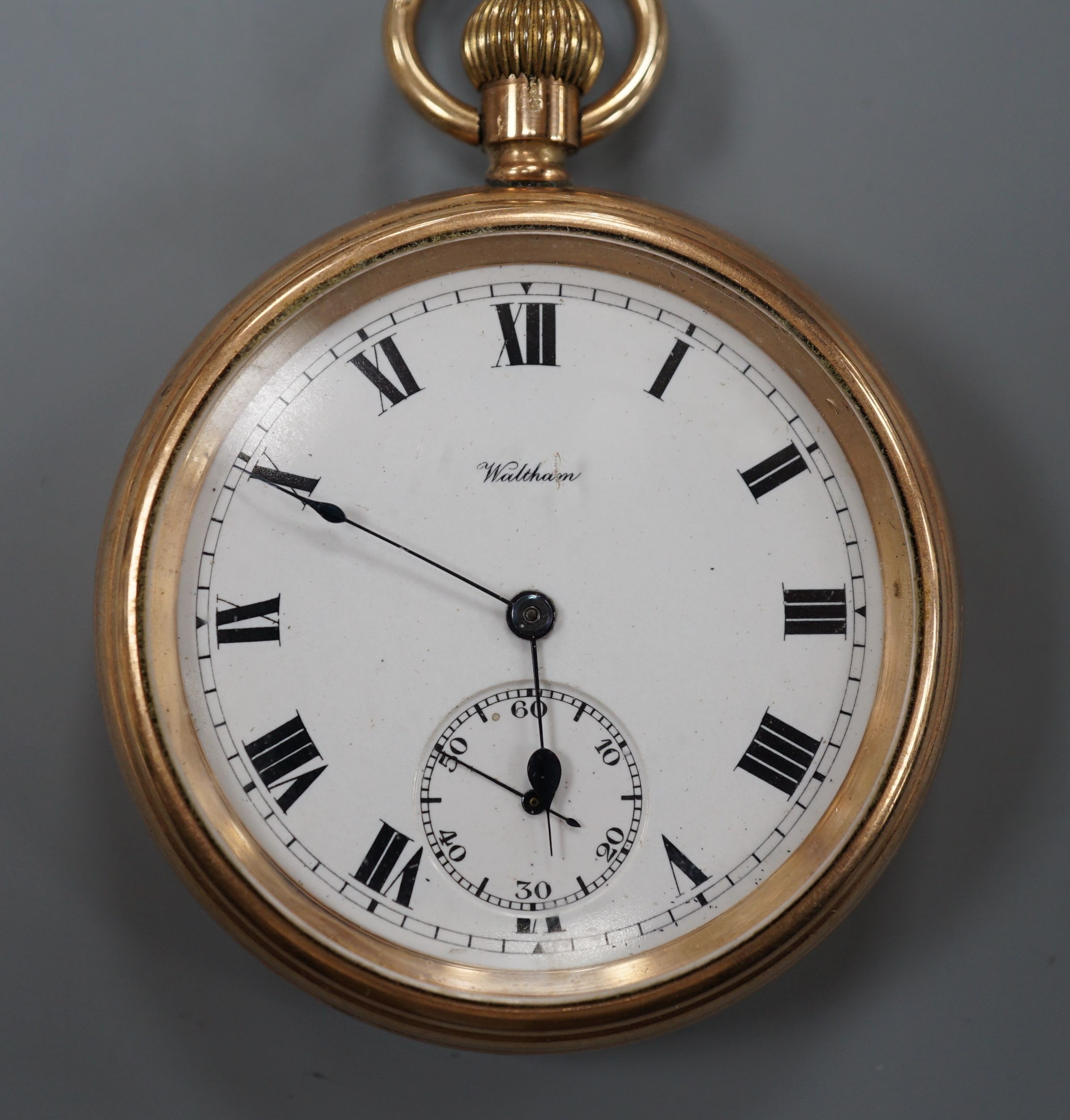 A 9ct gold Waltham keyless pocket watch, with enamelled Roman dial and subsidary seconds, movement