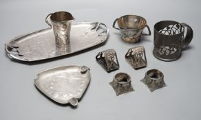 An Arts and Crafts Tudric pewter mug, stamped 534, a pair of WMF napkin rings together with other