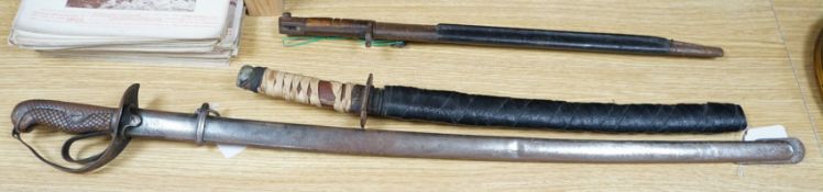 A Japanese wakizashi, a WWI bayonet and a Continental sword, sword 94cms long