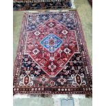A North West Persian red ground rug, 160 x 110cm