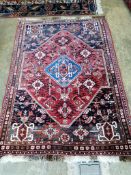 A North West Persian red ground rug, 160 x 110cm