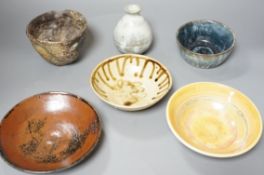 Studio pottery; a group of three bowls, a tenmoku dish, a small vase and a large cup, some marked,