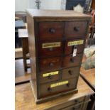 A Victorian style mahogany nine drawer apothecary chest, width 43cm, depth 28cm, height 78cm