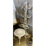 A Victorian cast iron hall stand, height 154cm, reduced and a later circular cast metal table (